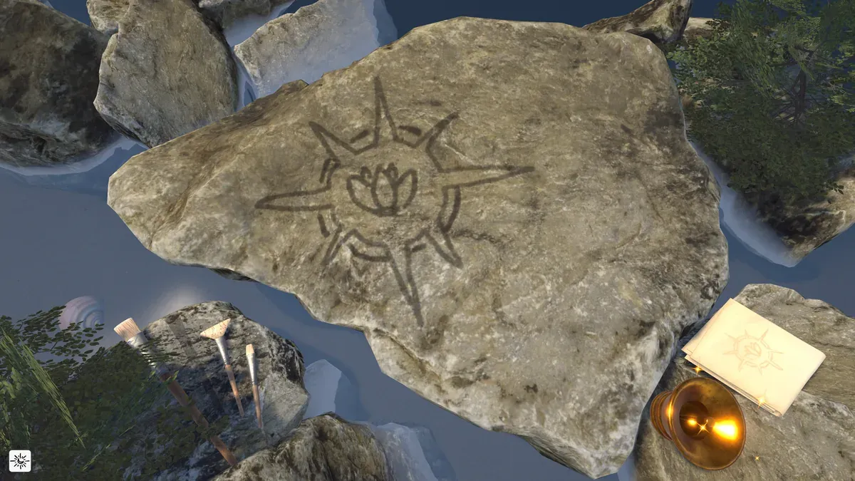A large flat stone in shallow water, marked with a radiating star-shaped water-paint sigil around a lotus flower. Brushes rest to the left; a small glowing bell and a matching sigil card sit to the right.